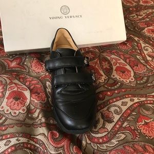 Young boy Versace shoes